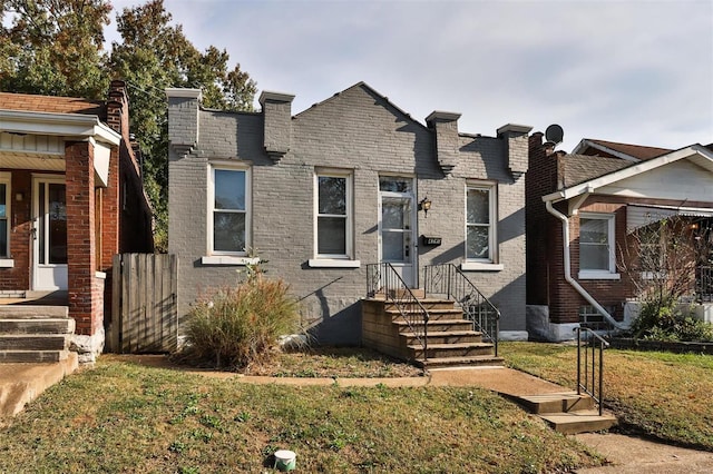 view of front facade with a front yard