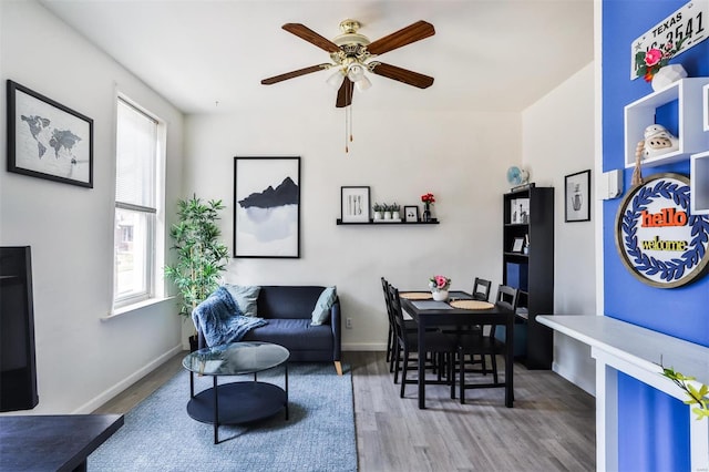 home office featuring ceiling fan, hardwood / wood-style flooring, and a wealth of natural light