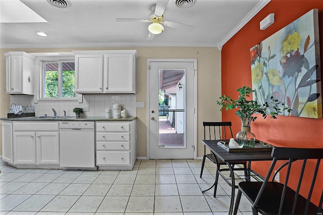 kitchen featuring a healthy amount of sunlight, white cabinets, and dishwasher