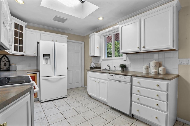 kitchen featuring white cabinets, white appliances, sink, light tile patterned flooring, and ornamental molding