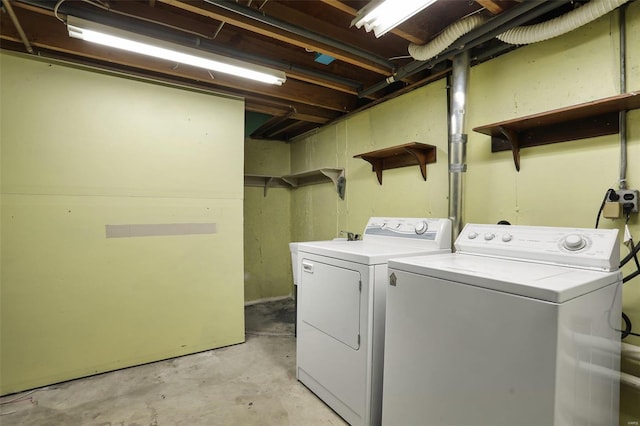 laundry area featuring washing machine and dryer