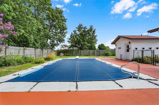 view of swimming pool featuring a patio