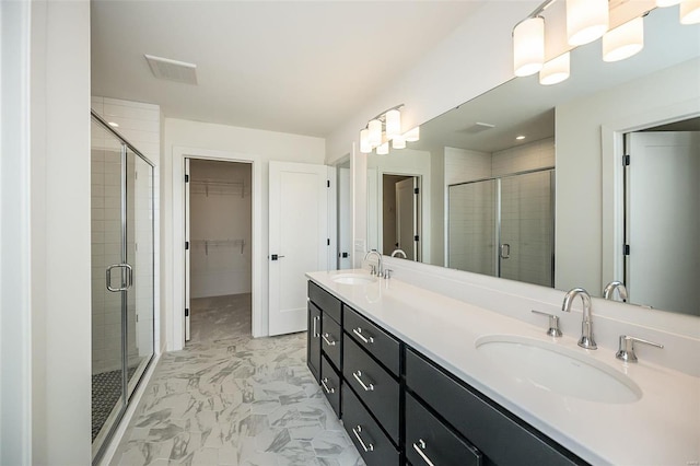 bathroom featuring vanity and walk in shower