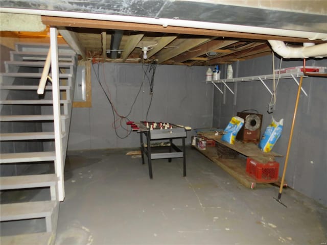 basement featuring electric panel