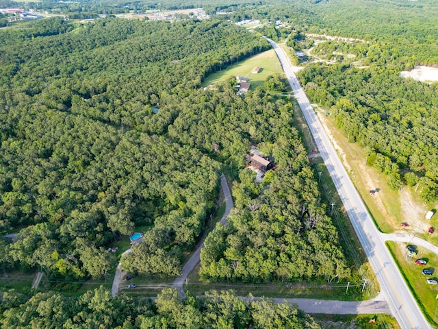 aerial view with a wooded view