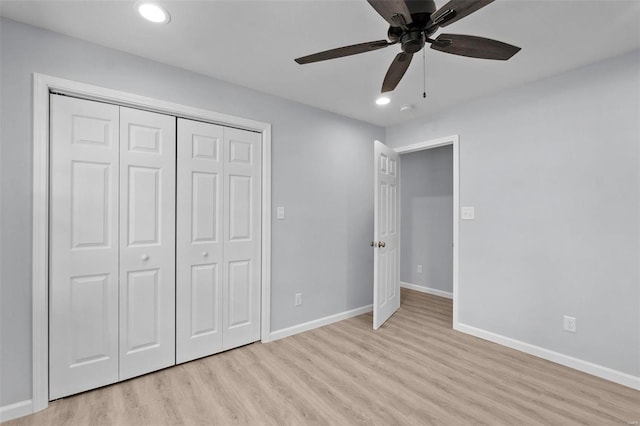 unfurnished bedroom with ceiling fan, recessed lighting, baseboards, light wood-style floors, and a closet