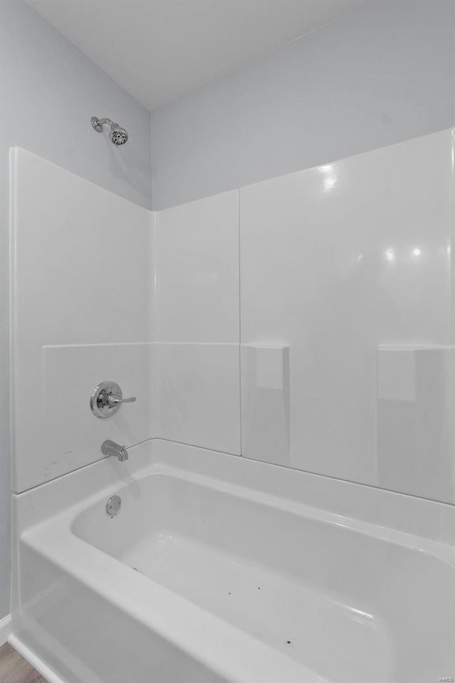 bathroom featuring washtub / shower combination