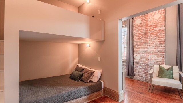 bedroom featuring wood-type flooring