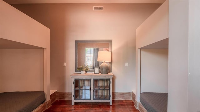 interior space with dark hardwood / wood-style flooring