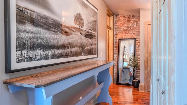 corridor with hardwood / wood-style floors