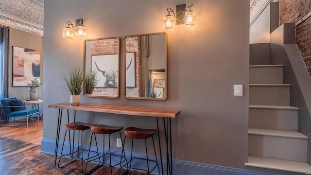 interior space featuring hardwood / wood-style flooring and a notable chandelier