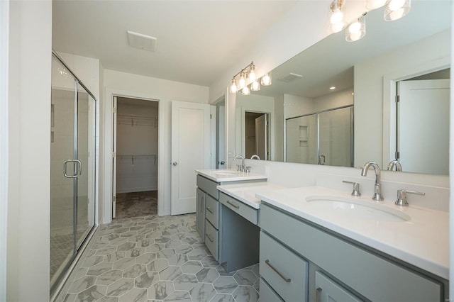 bathroom featuring vanity and walk in shower