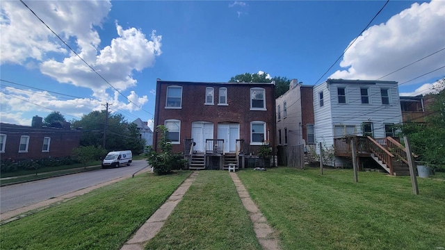 view of front facade with a front lawn