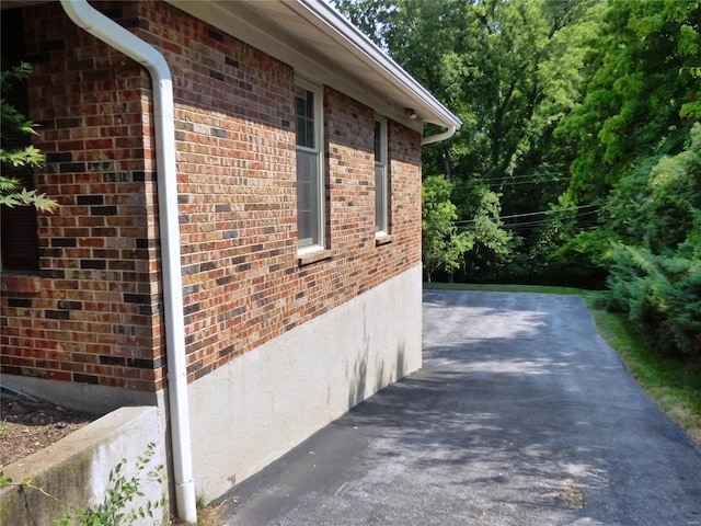 view of property exterior featuring a patio