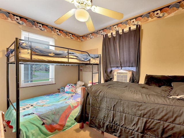 bedroom featuring cooling unit and ceiling fan