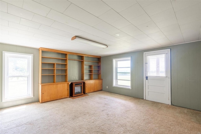 unfurnished living room with carpet floors