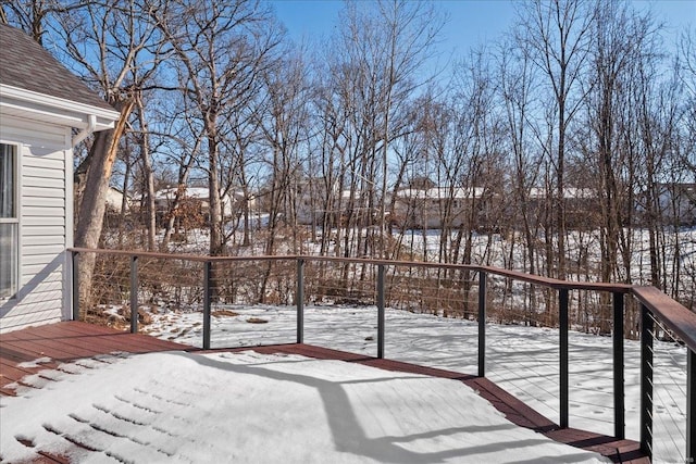 view of snow covered deck