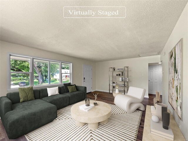 living room featuring a textured ceiling