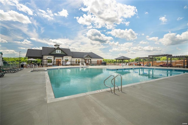 view of swimming pool with a patio area