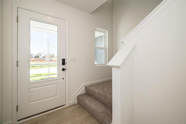 doorway to outside featuring light hardwood / wood-style floors