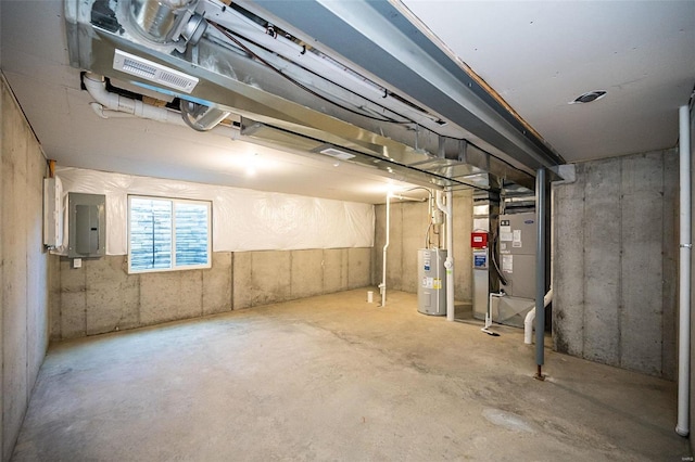 basement with electric water heater, electric panel, and heating unit