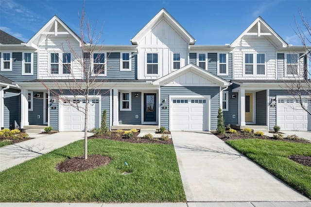 view of front facade with a garage and a front lawn