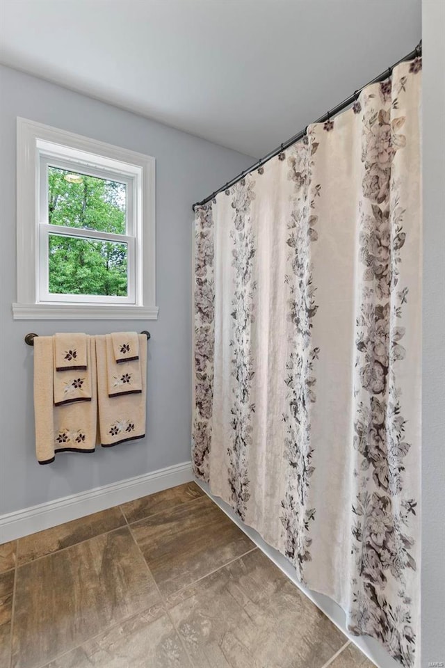 bathroom featuring tile patterned flooring