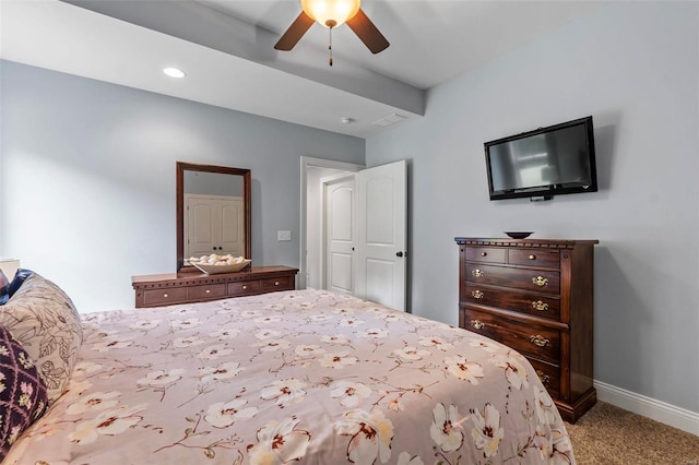 bedroom with light carpet and ceiling fan