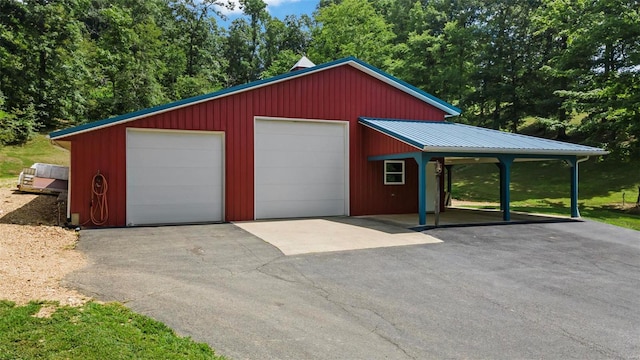 garage with a carport