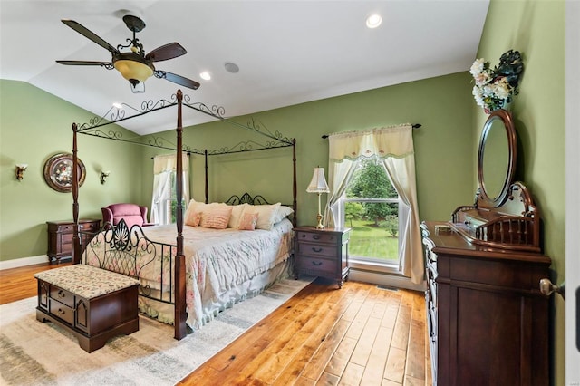 bedroom featuring light wood-type flooring and ceiling fan