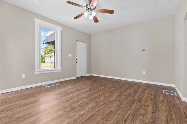 unfurnished room featuring hardwood / wood-style flooring and ceiling fan