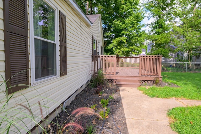 view of yard with a wooden deck