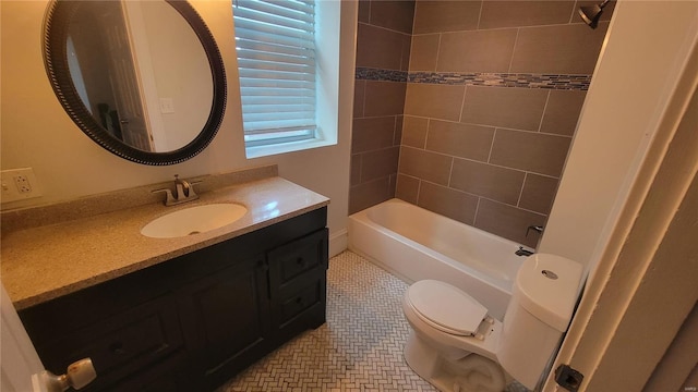 full bathroom with tiled shower / bath combo, tile patterned flooring, vanity, and toilet