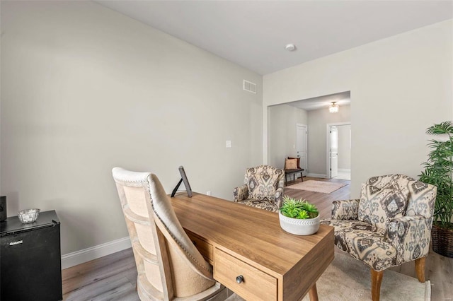 office area featuring light hardwood / wood-style flooring