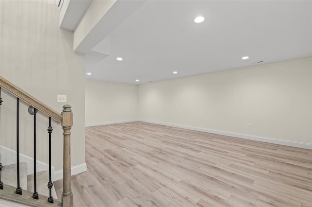 empty room with light hardwood / wood-style floors