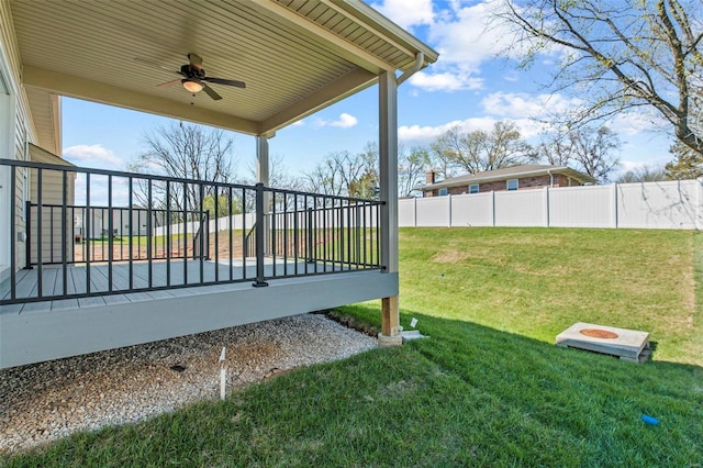 view of yard featuring ceiling fan