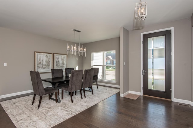 dining area featuring dark hardwood / wood-style floors