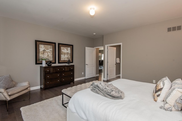 bedroom featuring dark wood-type flooring