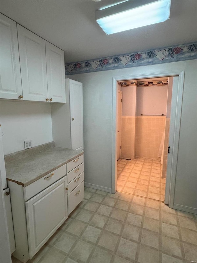 kitchen with white cabinetry