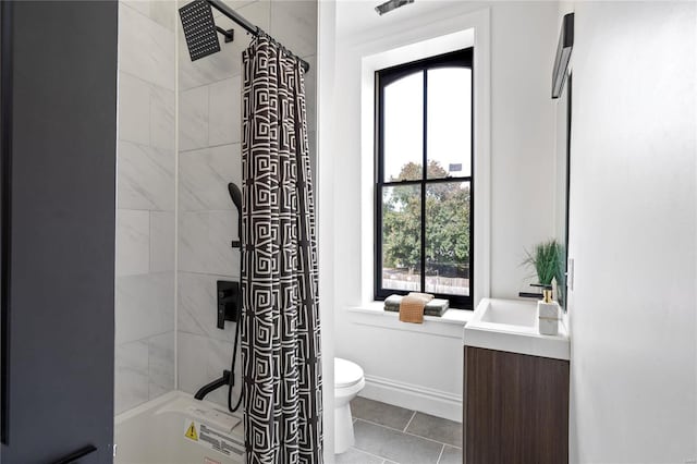 full bathroom featuring toilet, shower / tub combo with curtain, vanity, and tile patterned floors