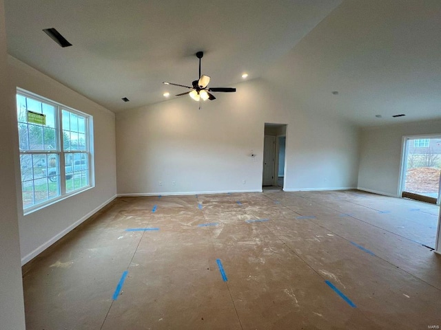 unfurnished living room featuring ceiling fan, high vaulted ceiling, and a healthy amount of sunlight