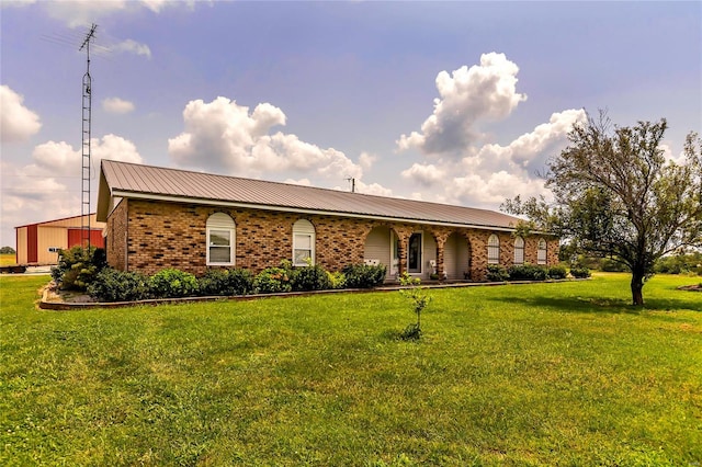 view of front facade with a front lawn