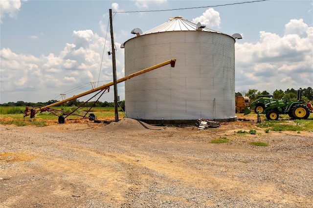 view of outdoor structure featuring a rural view