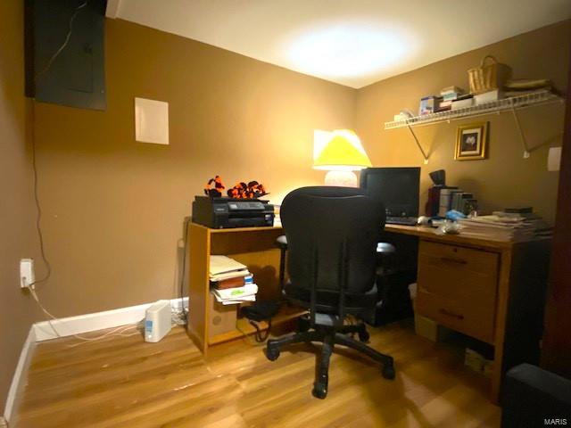 home office featuring hardwood / wood-style floors