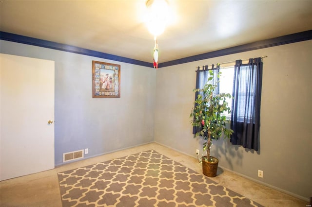 view of carpeted spare room