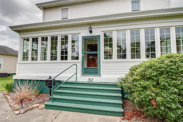 property entrance featuring cooling unit