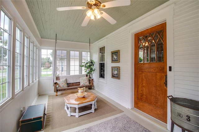 sunroom / solarium with ceiling fan