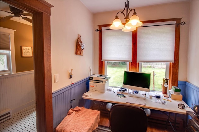 home office with tile patterned flooring, ceiling fan with notable chandelier, and a wealth of natural light