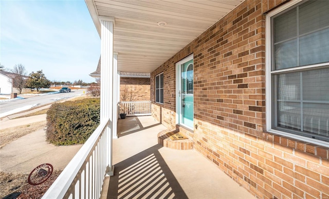 balcony featuring a porch