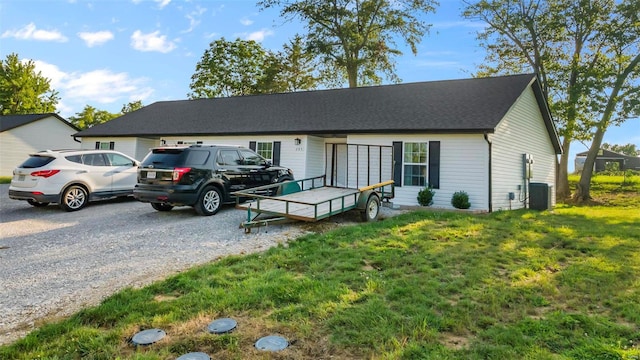 ranch-style house with a front lawn